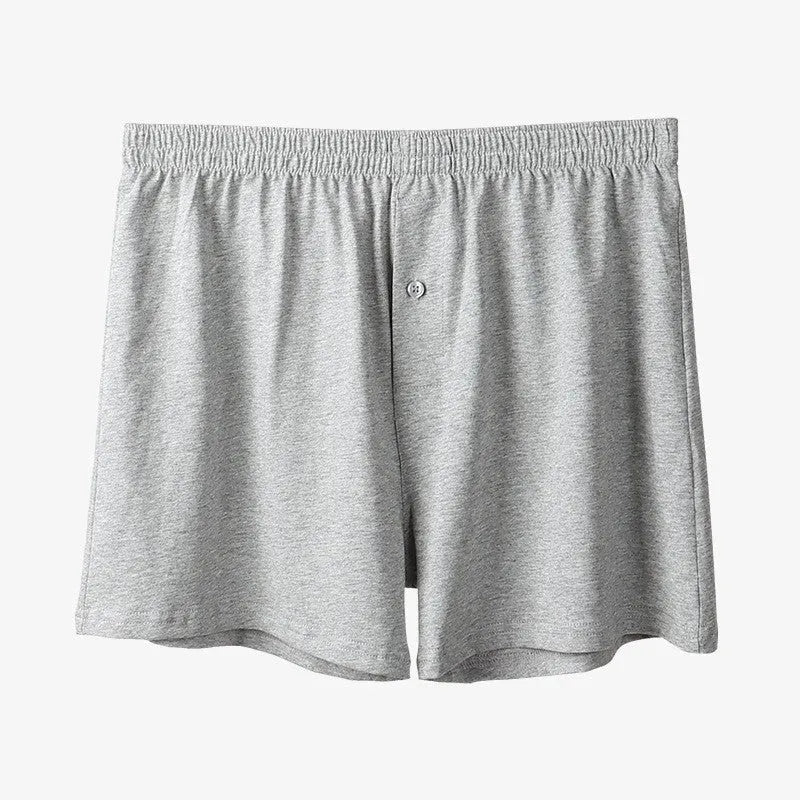 Men's solid colour cotton boxer shorts with a high waist and loose fit.