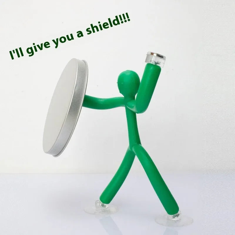 Small plastic decompression toy ornament in green with reject anxiety text, in iron box