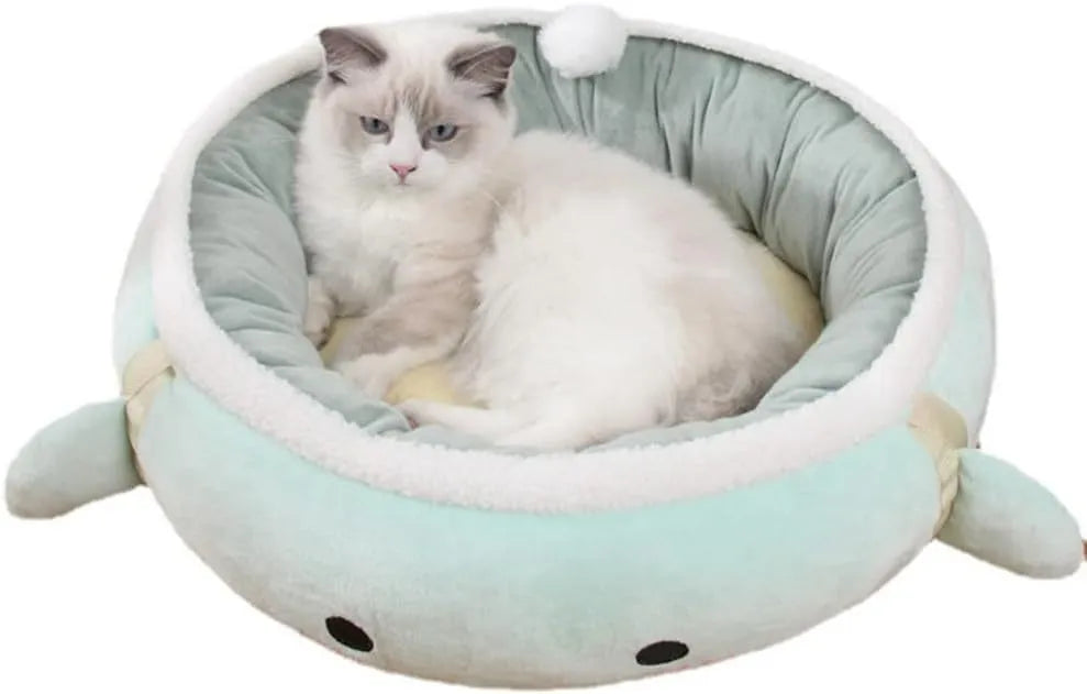 Green chick-shaped cat bed shown both laid flat and hanging as a hammock for small pets.