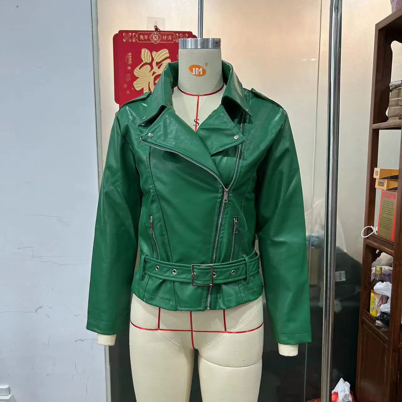 Black punk-style short jacket with a Peter Pan collar and drawstring waist.