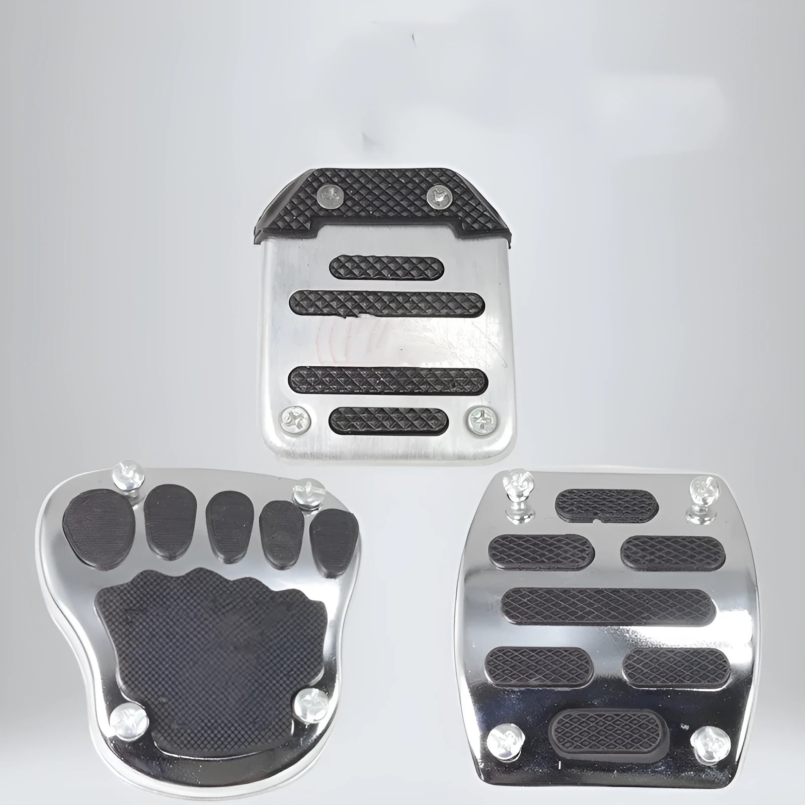 Metal motorcycle brake pedal skid plate showing three style variations for universal fit
