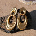 Double circle French retro earrings in plain gold finish with copper construction
