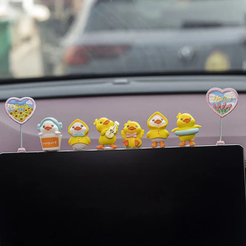 PVC cartoon duckling car decoration set with six yellow ducklings and one sign for dashboard or mirror