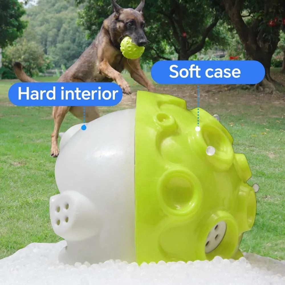Durable natural rubber dog ball with meteorite-shaped bumps for aggressive chewers in multiple colour options