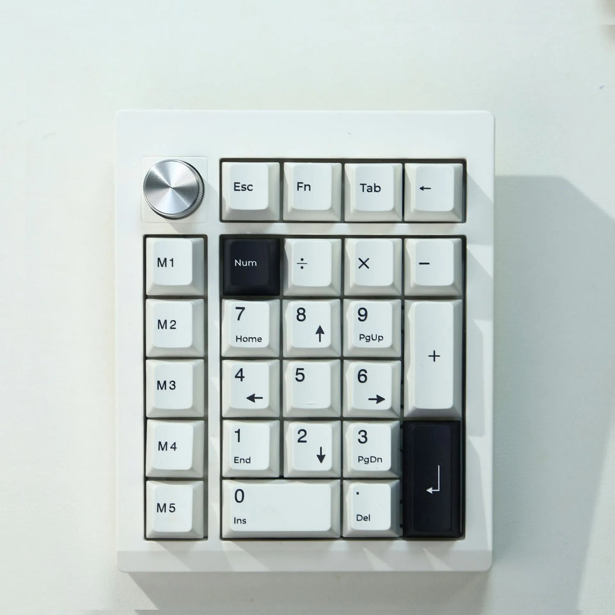 Wireless mechanical numeric keyboard with Bluetooth and 2.4G wireless connectivity in black and white colour options
