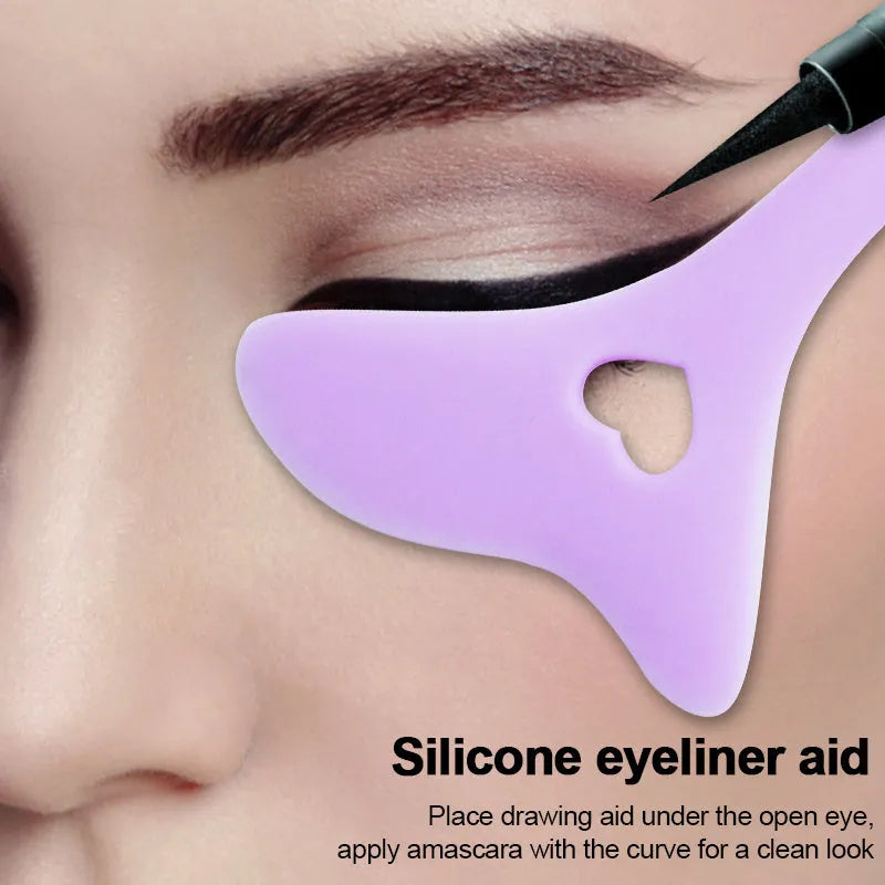 Four reusable silicone winged eyeliner stencils in pink, blue, purple, and yellow on a white background
