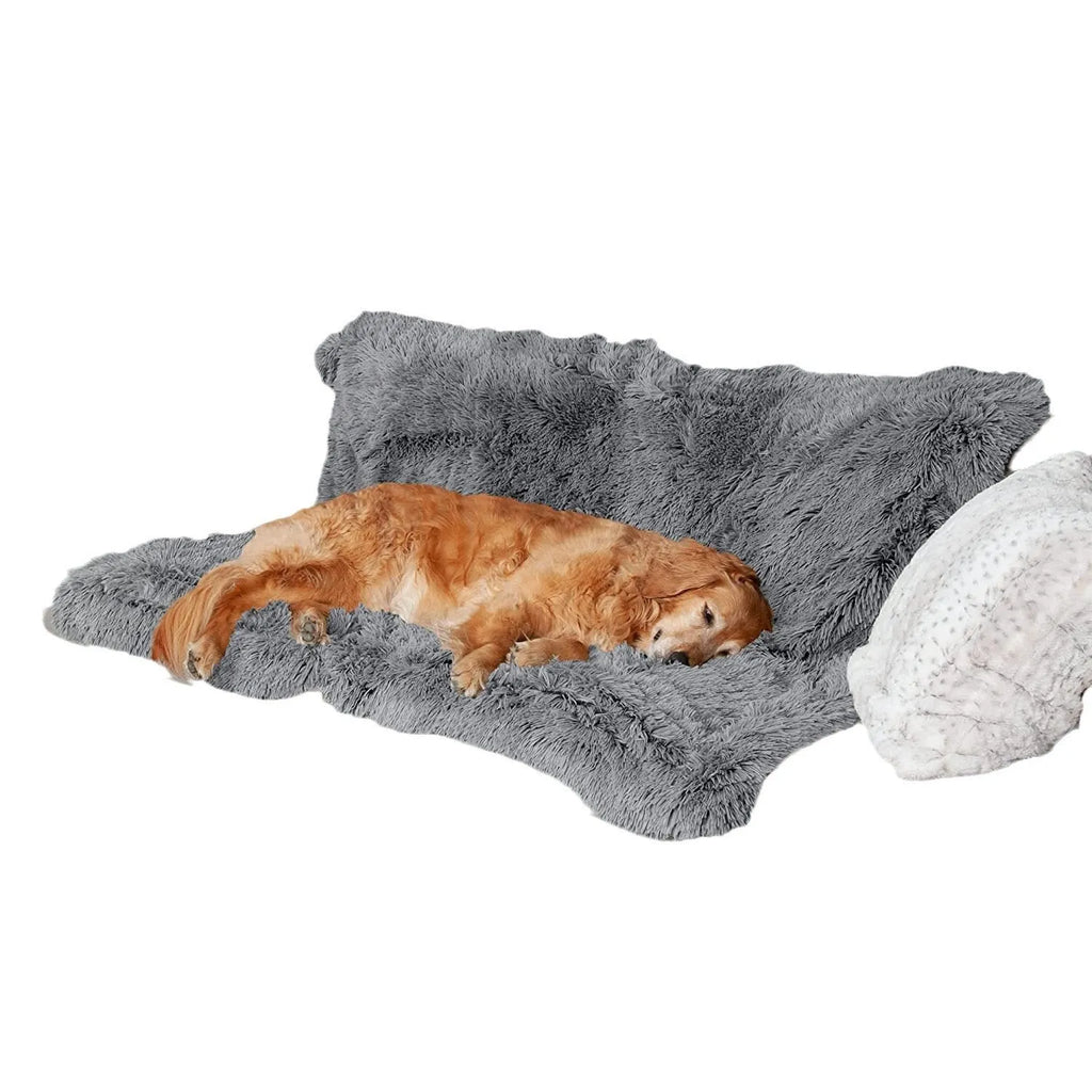 Dark grey plush waterproof dog cushion bed in a large size on a floor