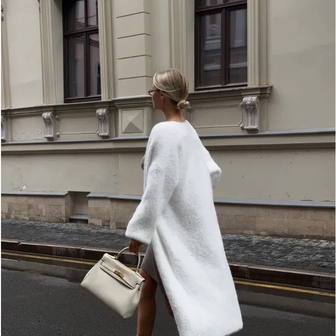 White long knitted cardigan jacket on a model, showing loose fit and 105cm length.