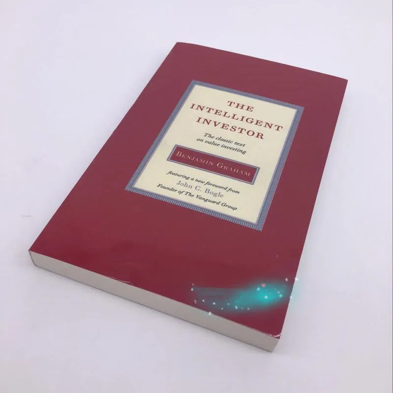 Paperback copy of The Intelligent Investor book by Benjamin Graham, front cover showing title and author.