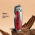 Metal folding lighter with integrated knife blade showing wood grain finish and one-click unfolding mechanism