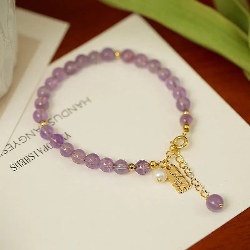 Women's lavender amethyst crystal bracelet with zodiac animal modelling in dark and light colour options