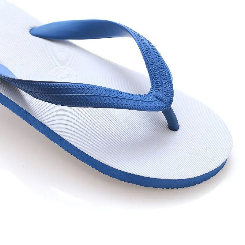 Green rubber flip-flops with a fish logo on a non-slip sole, showing deodorant feature.