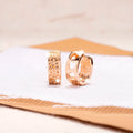 Rose gold hollowed heart shaped women's earrings with electroplated finish