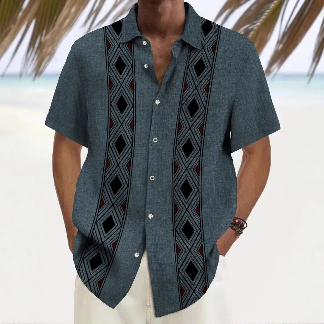 Man wearing a loose multicolour printed polyester shirt in a cardigan style.