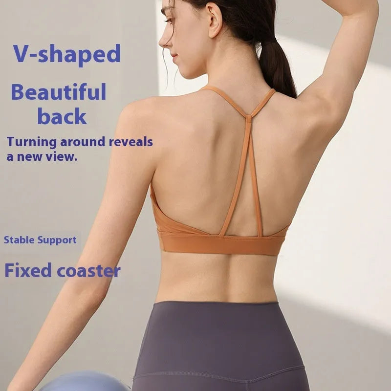 Women's high-strength nylon sports vest for running and yoga in black colour with double-shoulder straps.
