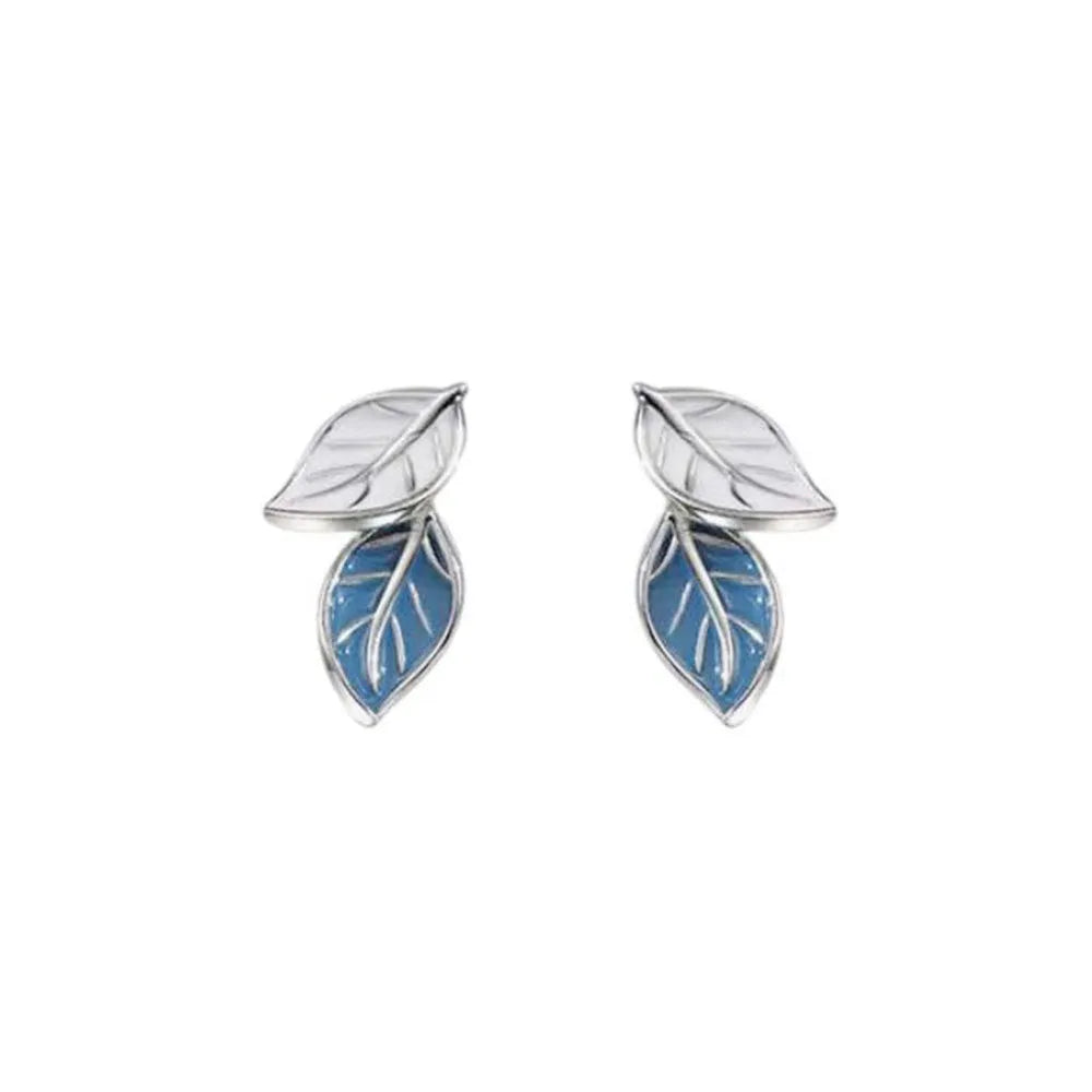Copper leaf-shaped stud earrings with white gold colour plating and post fastening