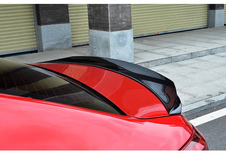 Mazda 3 Axela Exela large fixed blade tail trim spoiler in bright black finish for 2014-2021 models