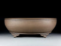 Handmade oval purple sand flowerpot in black mud green colour measuring 50cm long