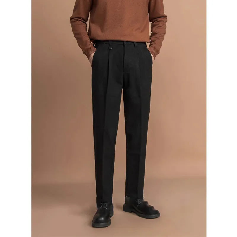 Men's straight-leg suit trousers in a draped fit, shown in a neutral colour.