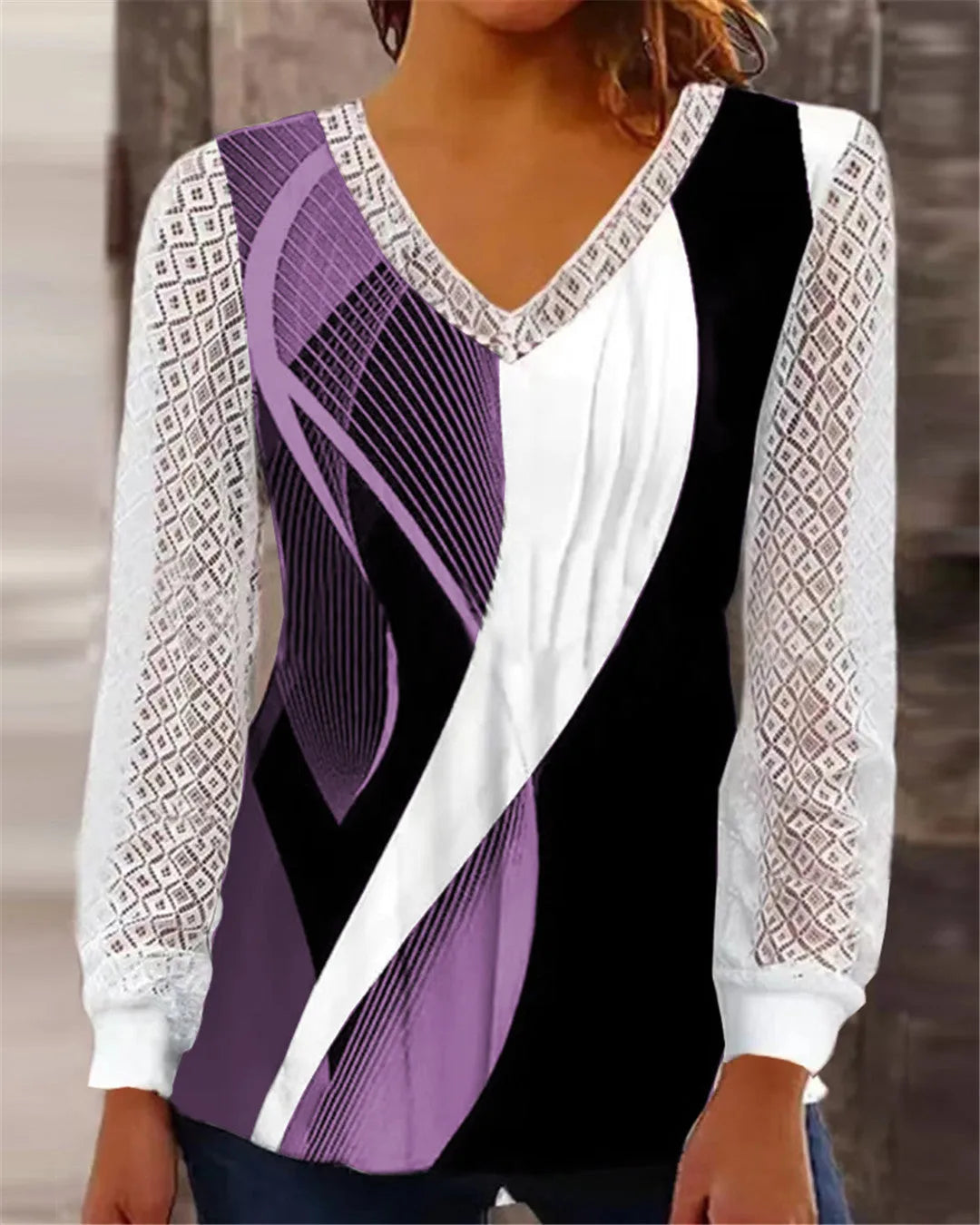 Loose fit V-neck lace top with hollow-out details in polyester fabric