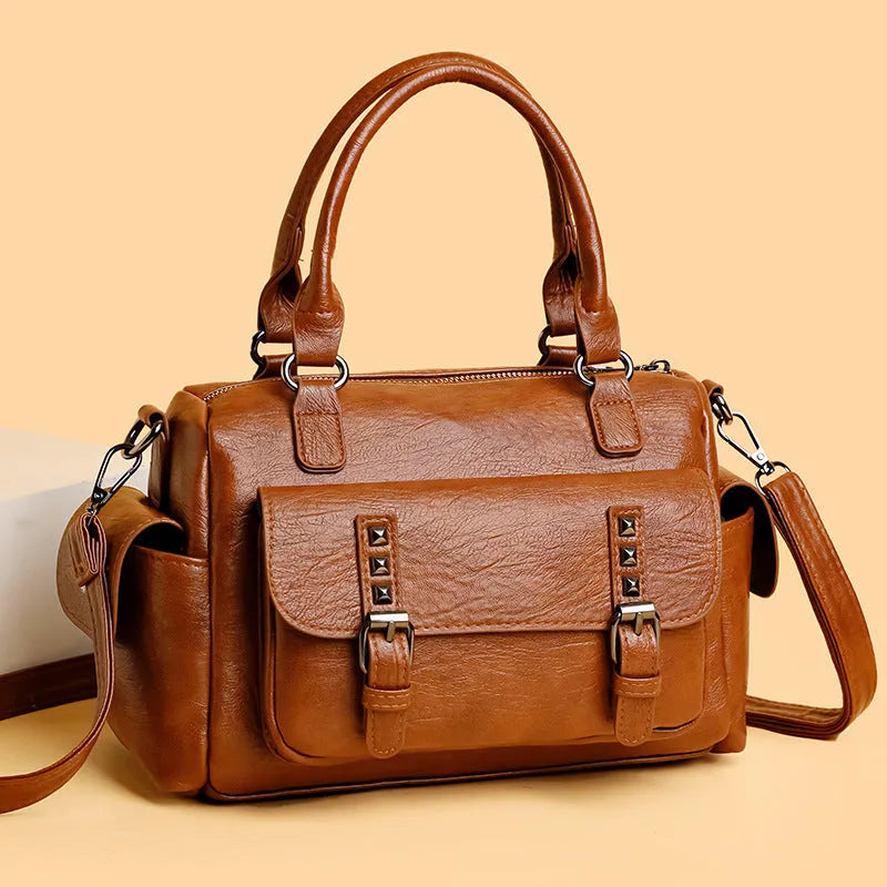 Vintage-style square messenger bag in PU leather with contrast stitching, shown in multiple colour options.
