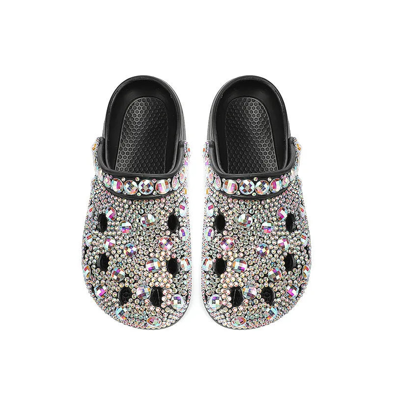 Black women's platform sandals with rhinestone detailing and a hole shoe design on an EVA sole.