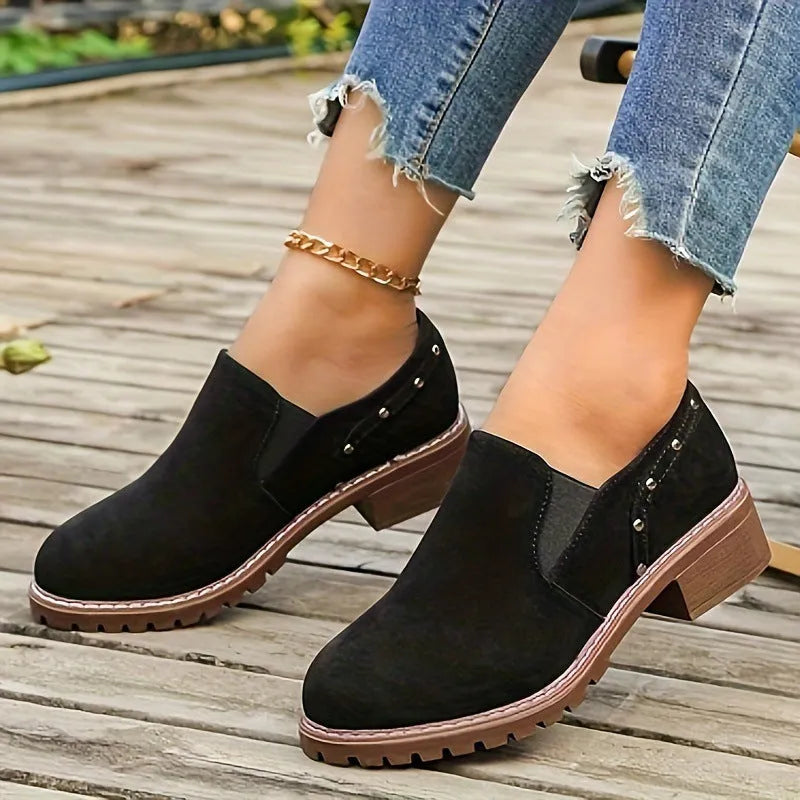 Plus size women's ankle boots in black suede with thick low heel and elastic band