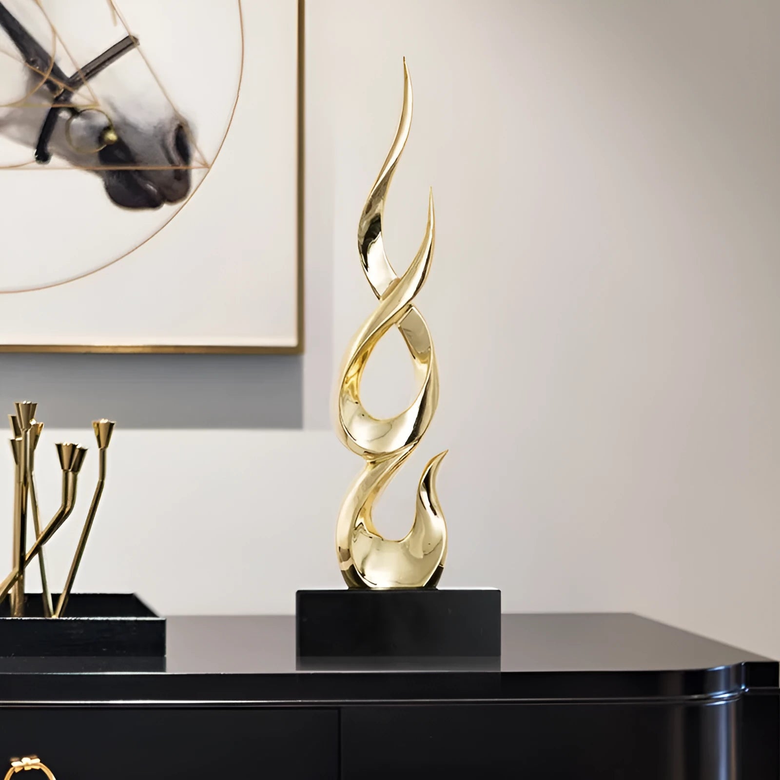 Resin decorative ornament in gold colour with modern minimalist design for festival decoration