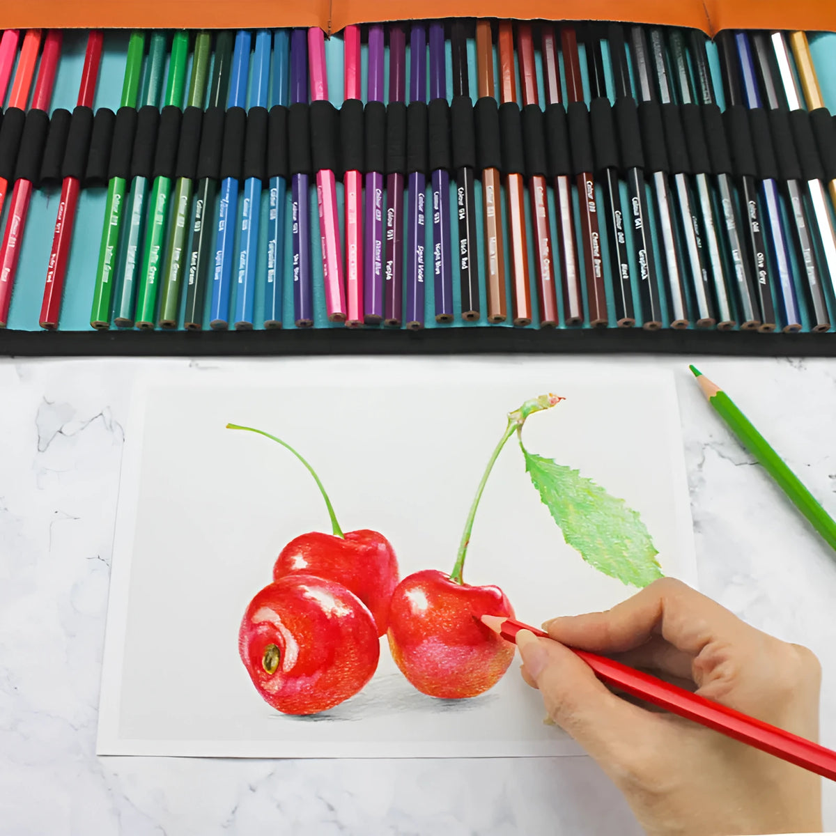 Wooden box containing 50 coloured pencils for oily painting with a separate pencil case.