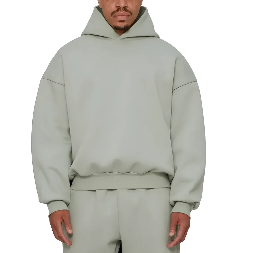 Men's grey fleece-lined pullover hoodie with wool interior showing long sleeves and solid colour design