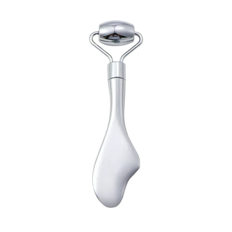 Stainless steel facial massage roller and heart-shaped gua sha plate set on a white background.