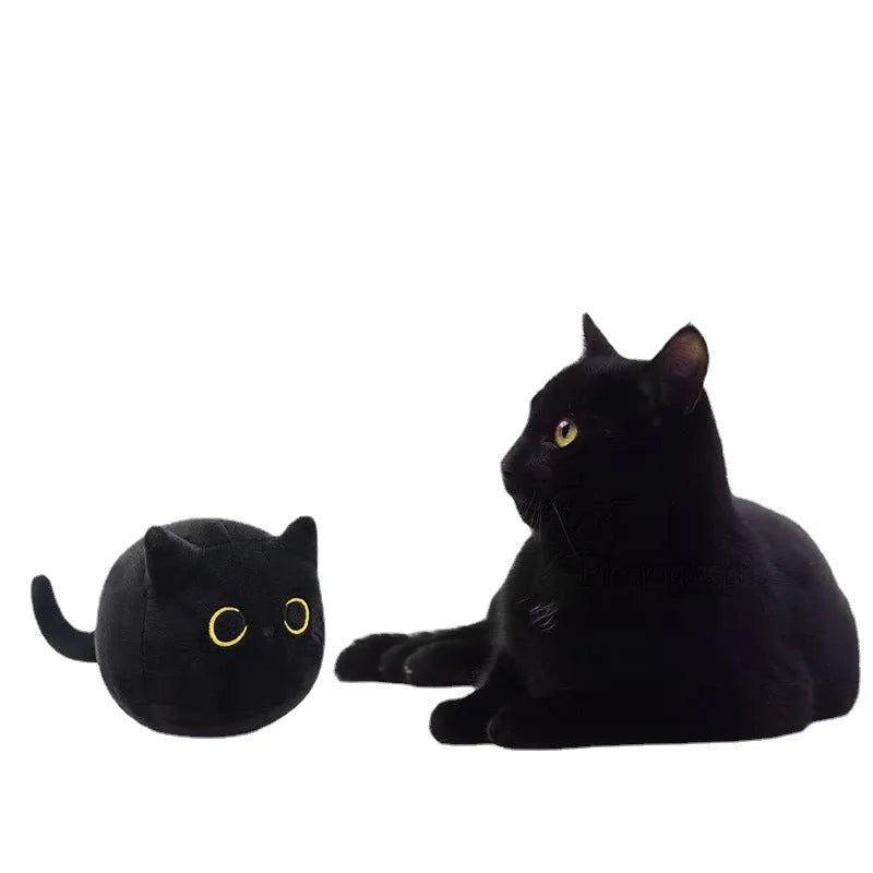 Black cat plush stuffed animal toy measuring 4 inches across