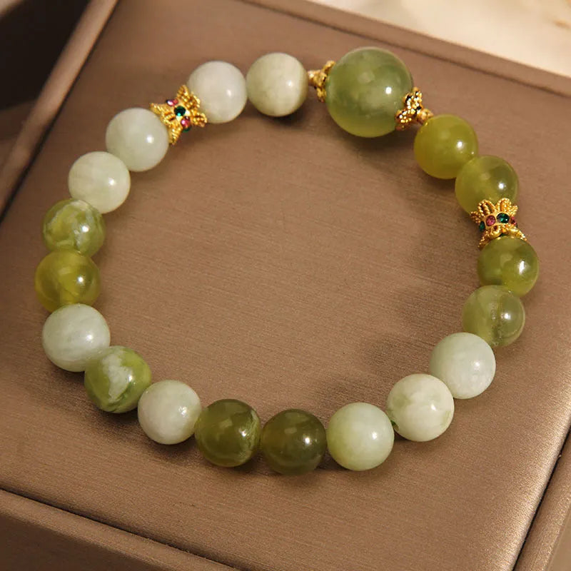 Women's jade bracelet in Xiuyan jade green colour with original design