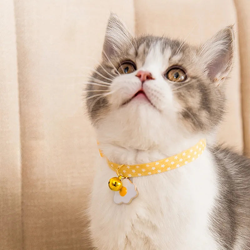 Adjustable cat collar with bell pendant and decorative bow tie accessory for small pets