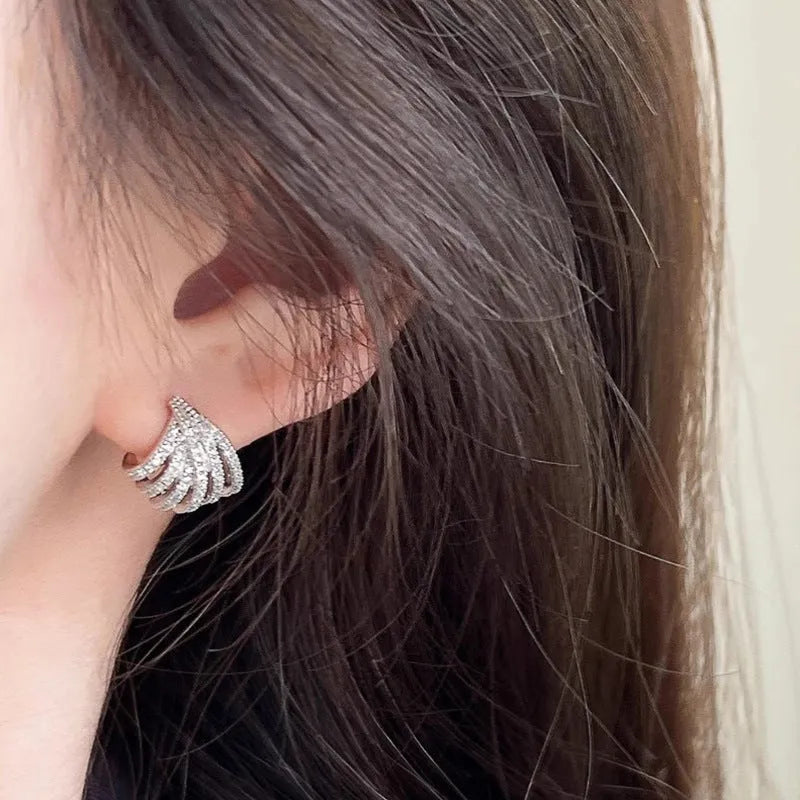 Geometric zircon earrings with platinum electroplated finish and European-American design style