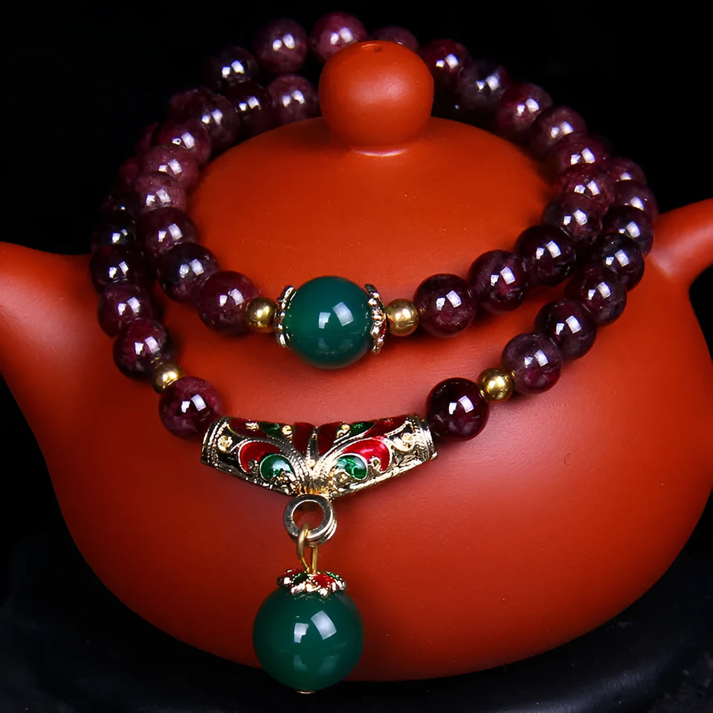 Natural garnet bracelet with 7mm beads, double ring design and Golden Toad charm jewellery