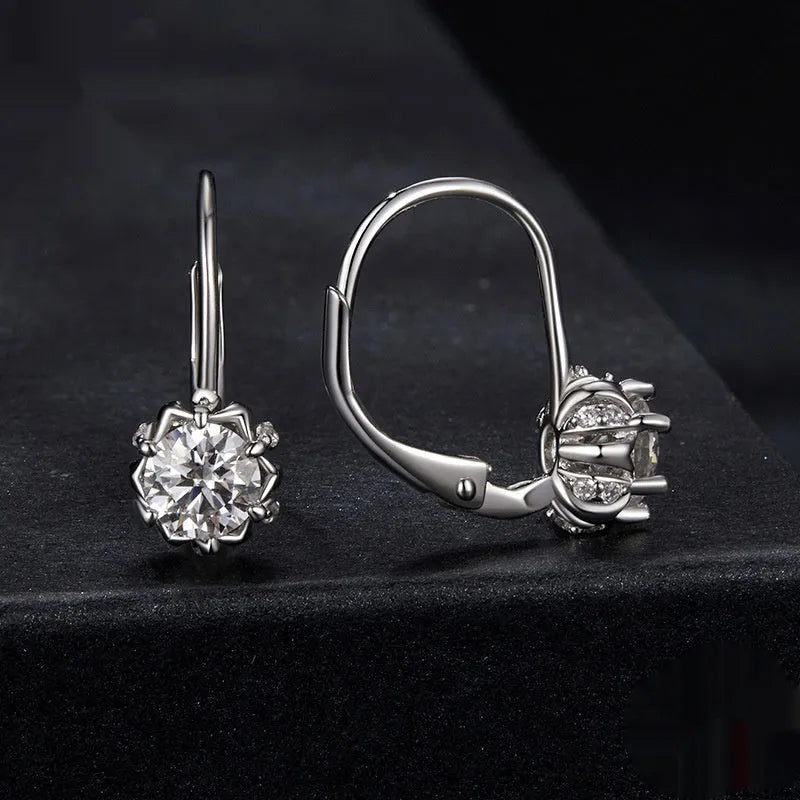 Sterling silver flower bud clip earrings with moissanite centre stone and white gold plating