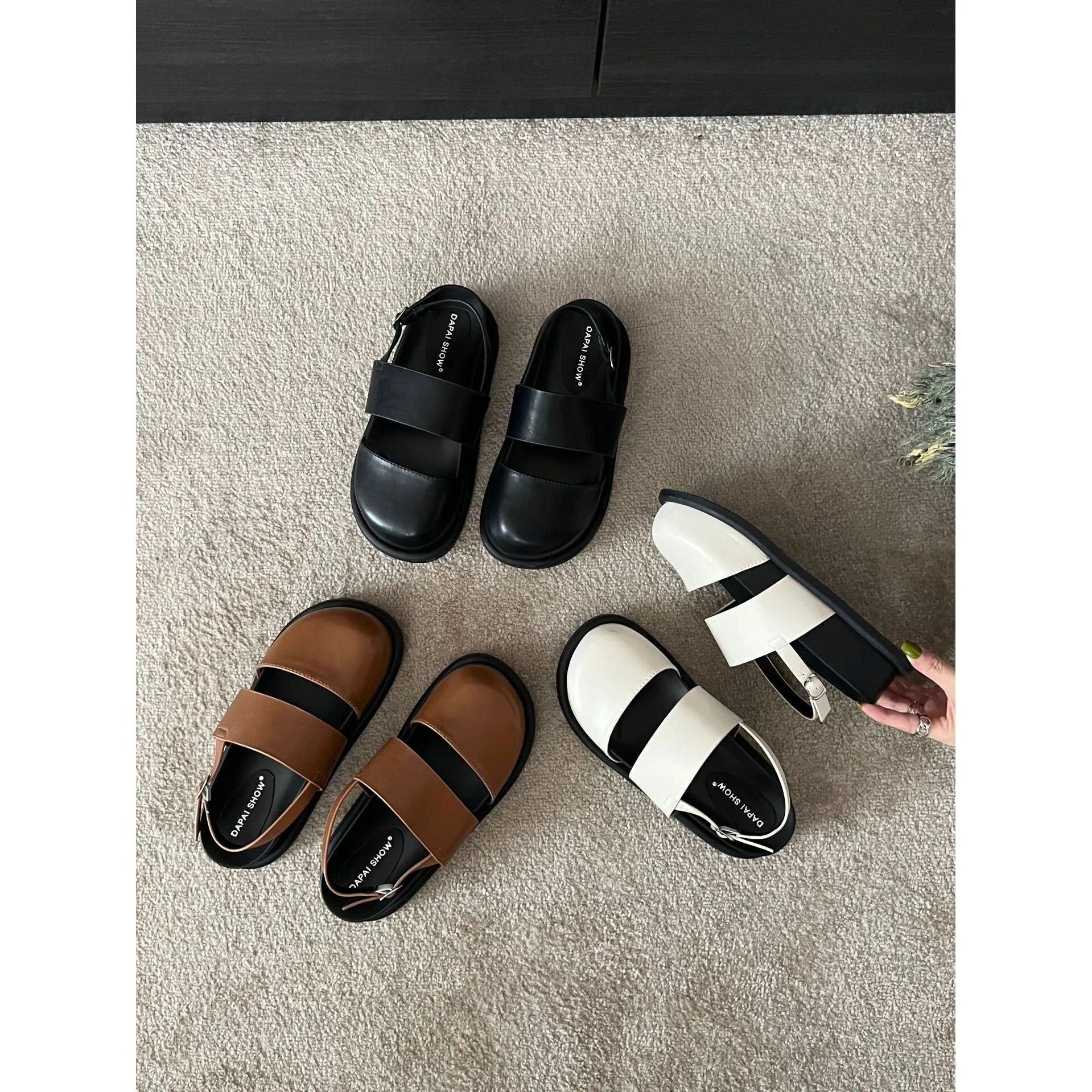 Retro raised sandals with ankle strap buckle in apricot colour showing closed toe design