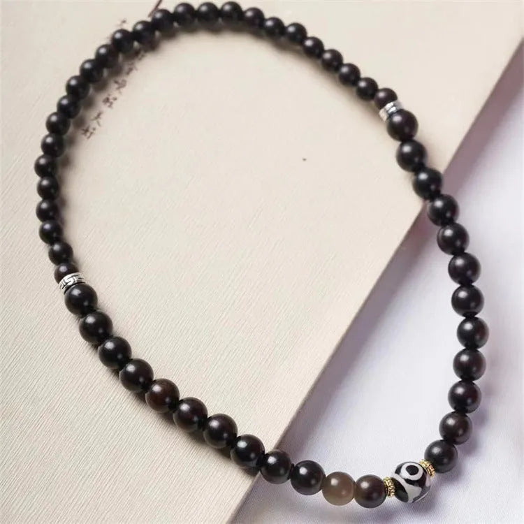 Tibetan ebony wood beads bracelet with 8mm beads and adjustable knot closure
