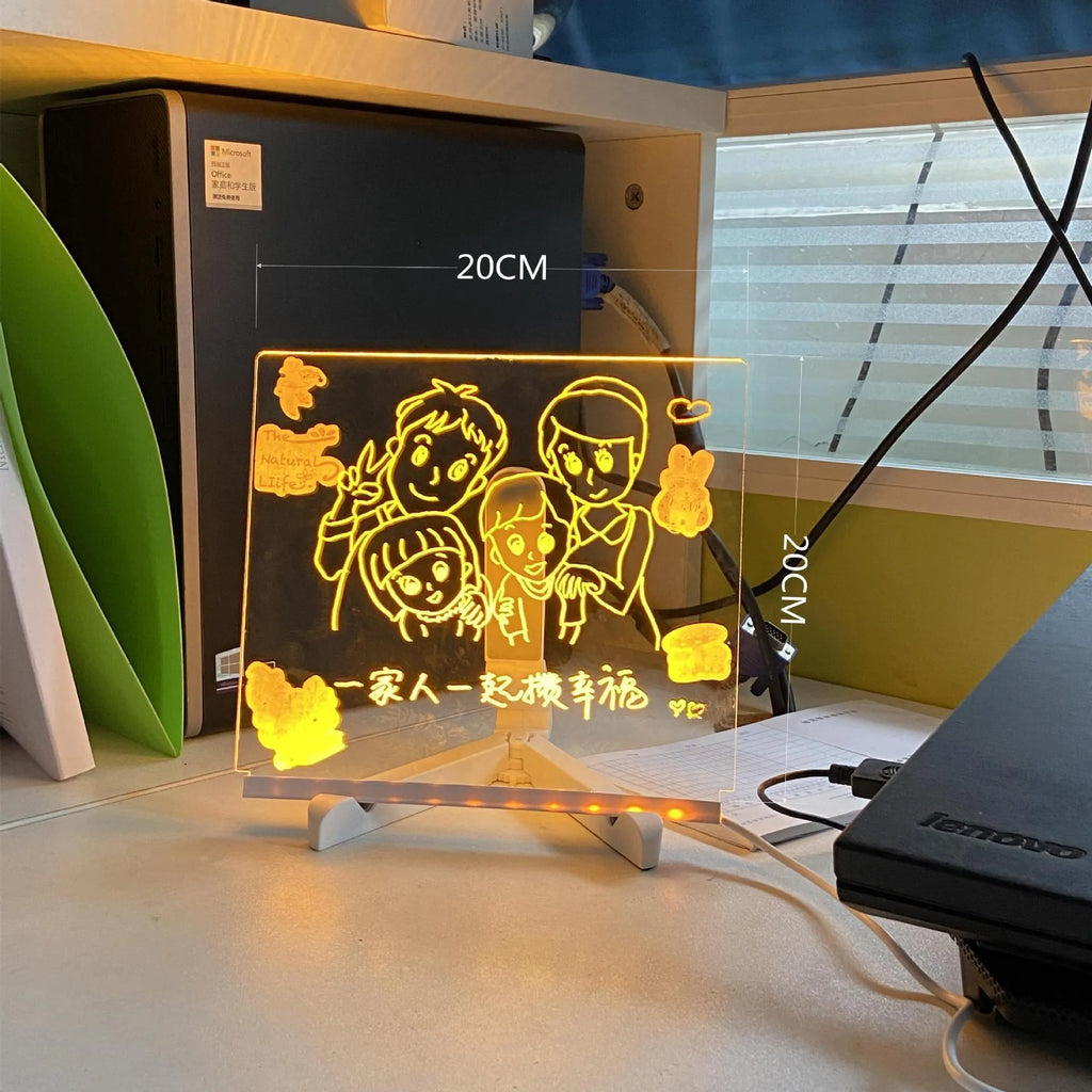 Acrylic DIY note board LED night light with USB cable, bracket, and colourful pens on a desk