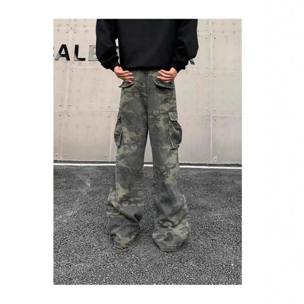 Cotton blend cargo pants in a washed camouflage print with multiple pockets and a mid waist.