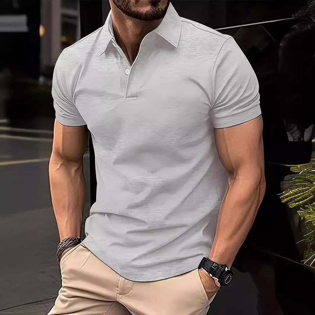 Men's slim fit short sleeve button-up shirt in a solid colour, made from cotton-polyester blend fabric.