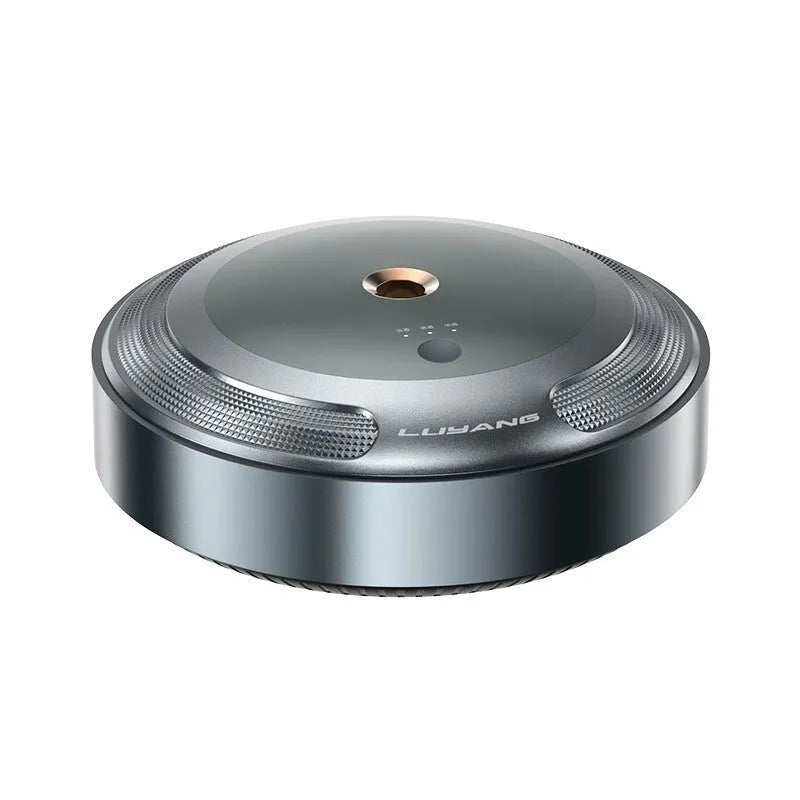 Compact zinc alloy car perfume diffuser with automatic spray function on an anti-slip pad.