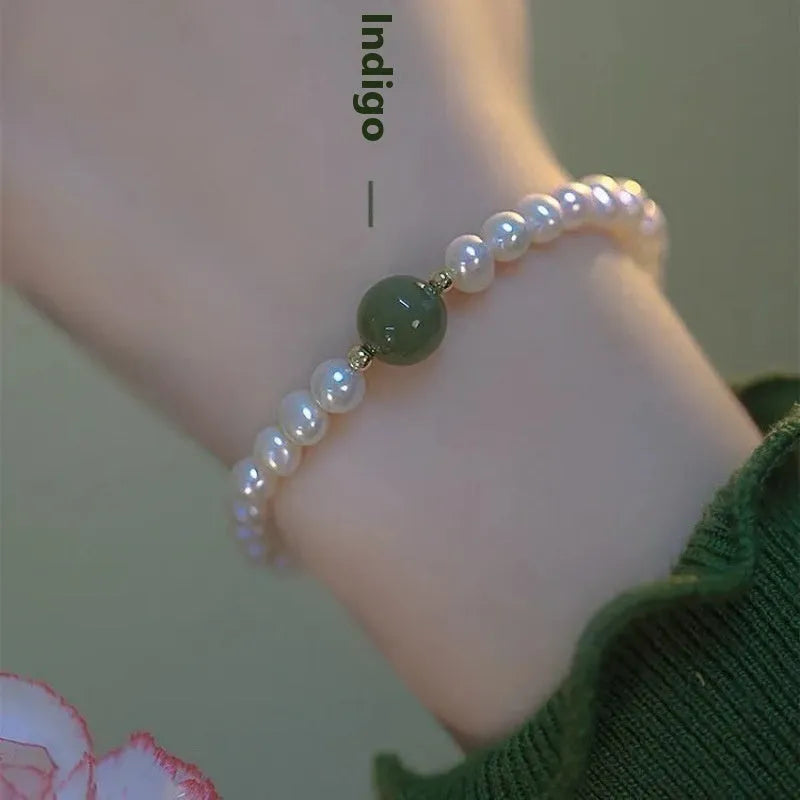 Chinese style glass bamboo leaf bracelet for women with manual craft details.