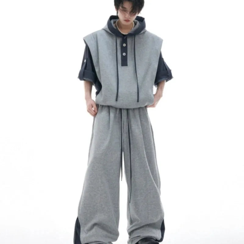 Polyester hooded tracksuit with three-dimensional stitching design in black and grey colours