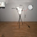 Scandinavian minimalist LED table lamp with iron body and acrylic shade on a wooden desk