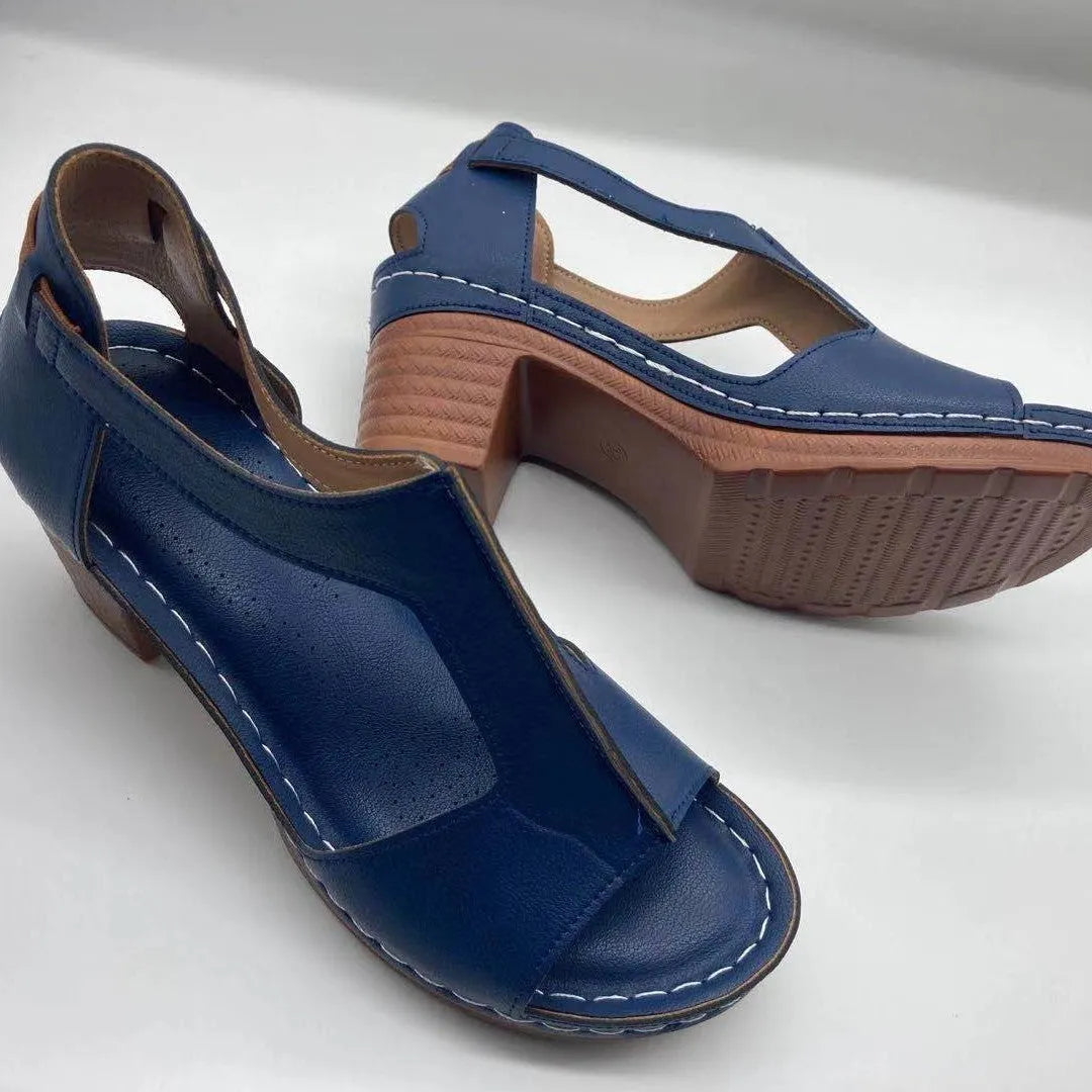 Peep toe wedge sandals with Roman style buckle and fish mouth open toe design in creamy-white colour
