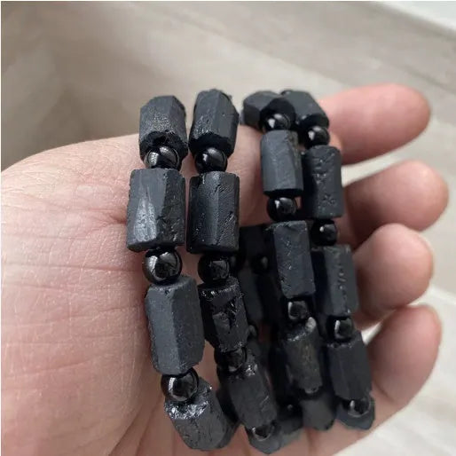 Natural black tourmaline bracelet with Seiko-treated beads approximately 9mm diameter
