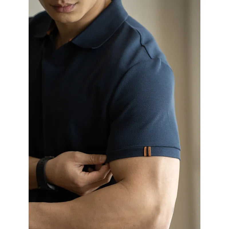 Man's blue short-sleeved cotton blend polo shirt with a collar, regular fit for summer.