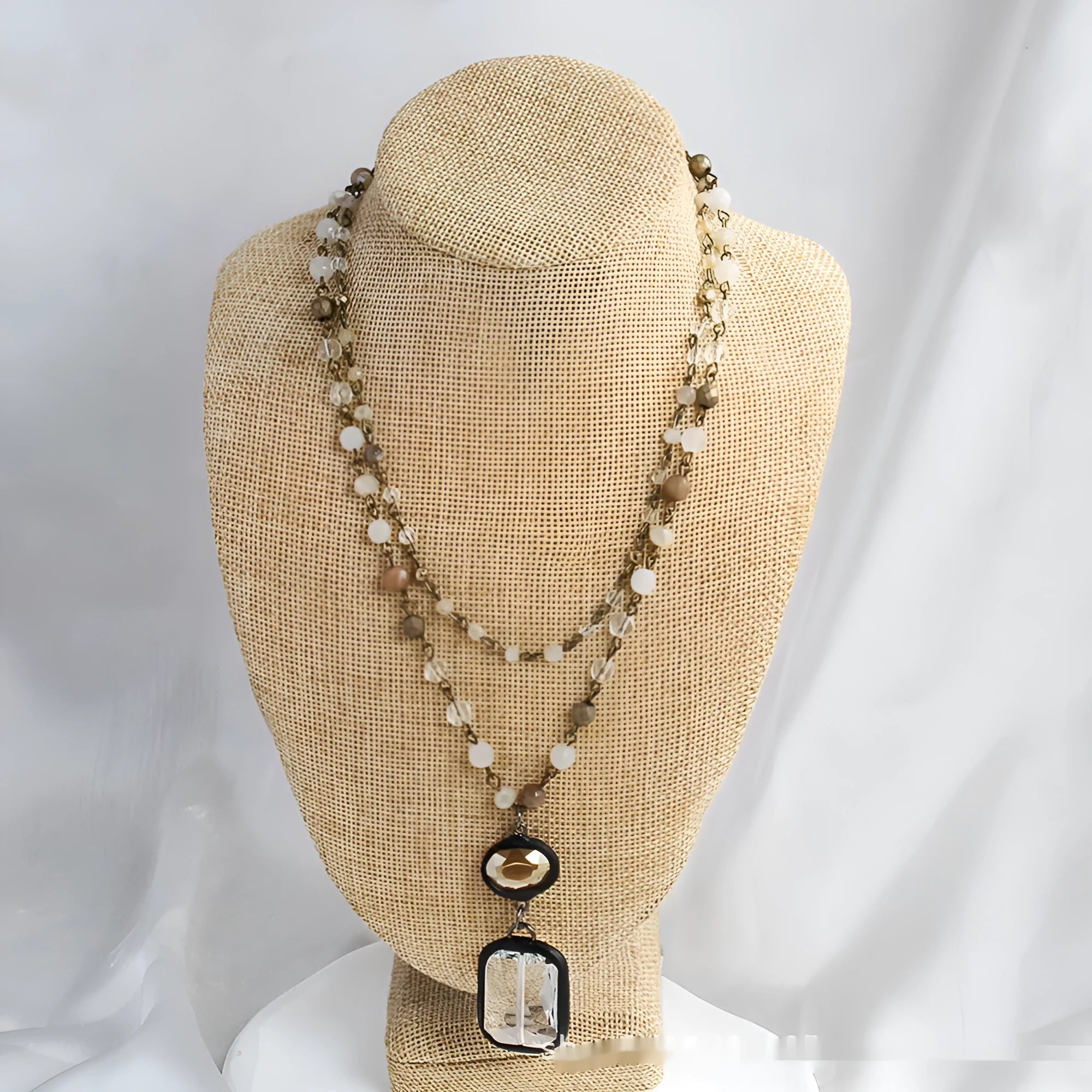 Tribal style two-layer necklace with glass and semi-precious stone pendant on adjustable chain
